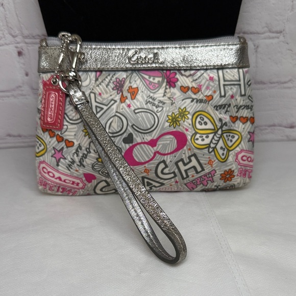 Coach Poppy Butterfly Graffiti Satan Wristlet Hangtag Silver Metallic LeatherEUC - Picture 10 of 16